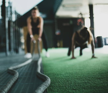 two person inside gym exercising